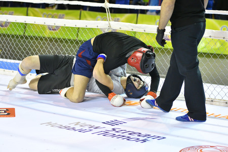 Orenburg, Russia - February 18, 2017 year: The fighters compete in mixed martial arts in the Championship of the Orenburg region on mixed martial artsのeditorial素材
