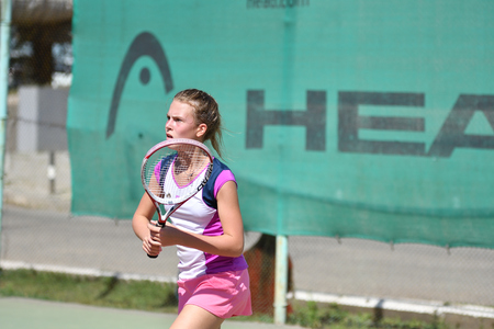 Orenburg, Russia - August 15, 2017 year: girl playing tennis on the prizes of the Tennis Federation of the Orenburg regionのeditorial素材
