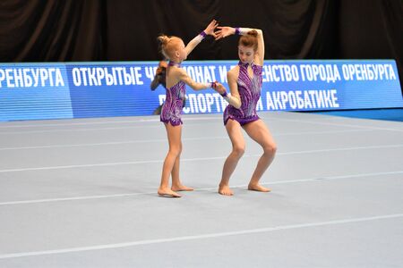 Orenburg, Russia, December 14, 2017 years: girl compete in sports acrobatics at the Open Championship in sports acrobaticsのeditorial素材