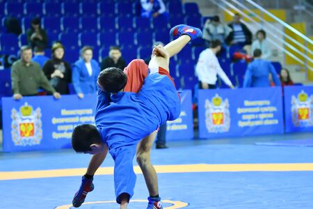 Orenburg, Russia - February 16, 2019: Boys competitions Self-defense without weapons in the Championship of the Orenburg region by Sambo among boys and girls born 2003-2004 biennium of birthのeditorial素材