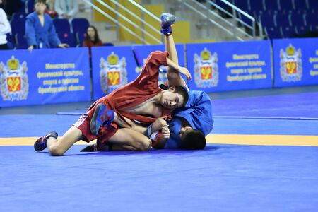 Orenburg, Russia - February 16, 2019: Boys competitions Self-defense without weapons in the Championship of the Orenburg region by Sambo among boys and girls born 2003-2004 biennium of birthのeditorial素材
