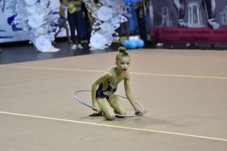 Orenburg, Russia - November 25, 2017 year: girls compete in rhythmic gymnastics on the Orenburg region Championship on rhythmic gymnastics "Winter melody-2017".のeditorial素材