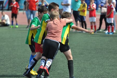 Orenburg, Russia - June 2, 2019 year: The boys play football in the preliminary games football festival "Lokobol-2019"のeditorial素材