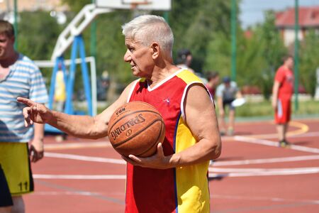 Orenburg, Russia - July 30, 2017 year: men play Street Basketball in the second round of the summer Street Basketball Leagueのeditorial素材