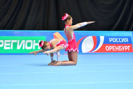 Orenburg, Russia, December 14, 2017 year: girl compete in sports acrobatics at the Open Championship in sports acrobaticsのeditorial素材