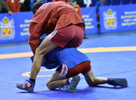 Orenburg, Russia - February 16, 2019: Boys competitions Self-defense without weapons in the Championship of the Orenburg region among boys and girls born 2003-2004 biennium of birthのeditorial素材