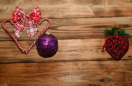 Christmas decorations and Christmas caramel on a wooden countertopの写真素材