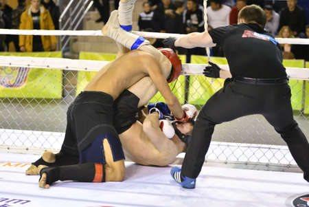 Orenburg, Russia - February 18, 2017 year: The fighters compete in mixed martial arts (MMA) in the Championship of the Orenburg region on mixed martial artsのeditorial素材