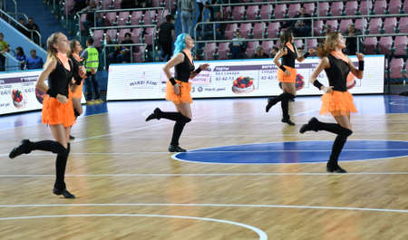 Orenburg, Russia - October 3, 2019: girls cheerleading perform at a basketball game in the match of the Russian Championship between basketball clubs "Hope" (Orenburg) and "Enisey" (Krasnoyarsk).のeditorial素材