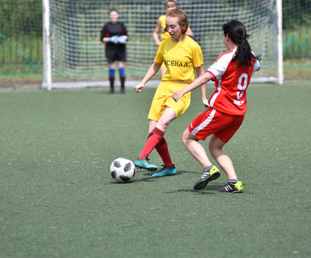 Orenburg, Russia - 12 June 2019 year: Girls play football women's tournament, dedicated to the Day...