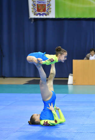 Orenburg, Russia, 26-27 May 2017 years: girl compete in sports acrobatics at the Open Championship Orenburga in sports acrobaticsのeditorial素材