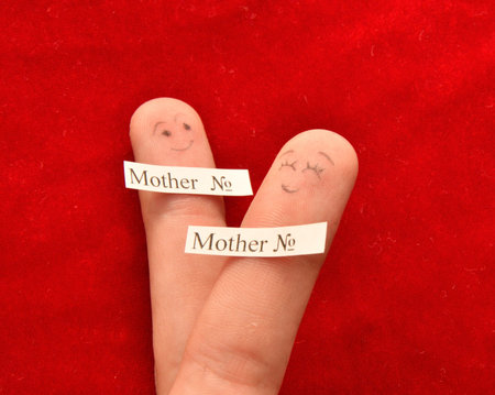 Crossed fingers on Valentine's Day in LGBT traditions