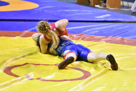 Orenburg, Russia - October 25-26, 2017: Girls compete in sports wrestling at the All-Russian tournament for the prizes of the Governor of Orenburg Regionのeditorial素材