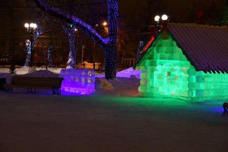 Ice hut (from a children's fairy tale) on New Year's Eve in the city parkの写真素材
