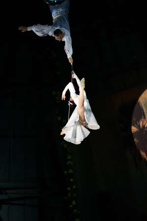 Orenburg, Russia - October 12, 2019: Aerialists perform their number at the circus arenaのeditorial素材