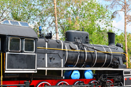 Russia, Orenburg, City Park: Elements of a vintage steam locomotive