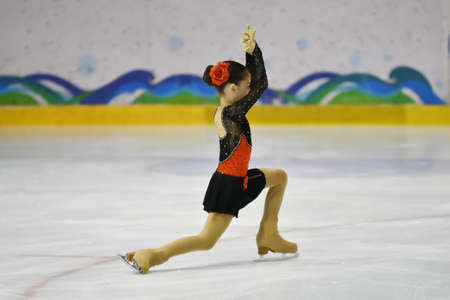 Orenburg, Russia - March 31, 2018: Girl competes in figure skating at competitions in the village of Rostoshi "Orenburg expanses"のeditorial素材