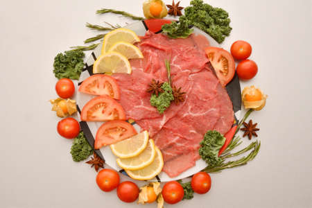 Carpaccio dish of thinly sliced pieces (slices) raw beef tenderloinの写真素材