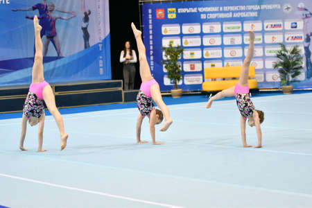 Orenburg, Russia, December 14, 2017: Girls compete in sports acrobatics at the Orenburg Open Championship in sports acrobaticsの写真素材