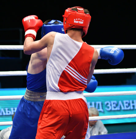 Orenburg, Russia - May 7, 2017: Two boys fighter compete in boxing at the Russian Junior Boxing Championshipの写真素材