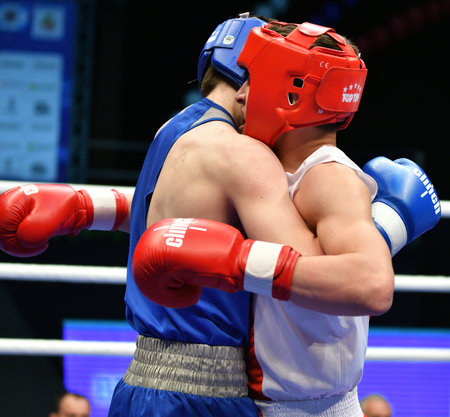 Orenburg, Russia - May 7, 2017: Two boys fighter compete in boxing at the Russian Junior Boxing Championshipの写真素材