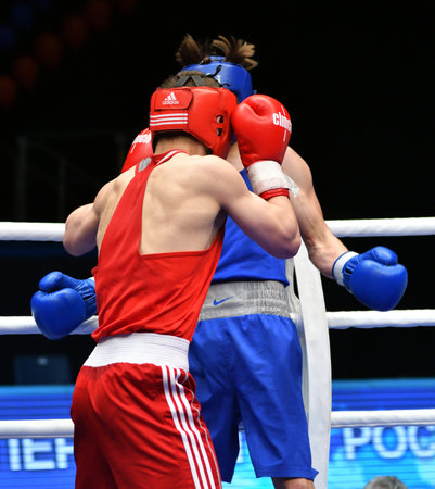Orenburg, Russia - May 7, 2017: Two boys fighter compete in boxing at the Russian Junior Boxing Championshipの写真素材