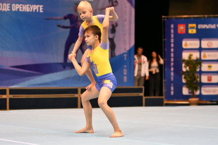 Orenburg, Russia, December 14, 2017: Boys compete in sports acrobatics at the Orenburg Open Championship in sports acrobaticsのeditorial素材