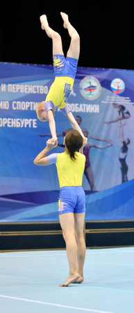 Orenburg, Russia, December 14, 2017: Boys compete in sports acrobatics at the Orenburg Open Championship in sports acrobaticsの写真素材