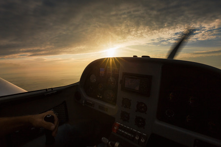 View from the cockpit of a light private plane while performing a leisure flight in autumn.の写真素材