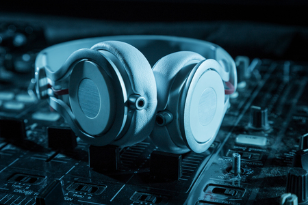 DJ sound equipment at nightclubs and music festivals, EDM, future house music and so on. Parties concept, sound technique. DJ playing on the best, famous CD players.の写真素材