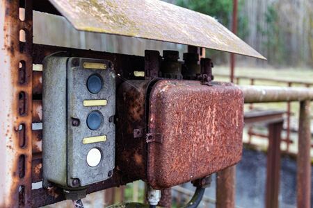 Old, rusty electrical control box. Close-up.の写真素材