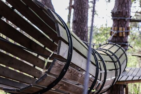 Wooden ring for obstacle course in the forest. Close-up. Extreme sport.の写真素材
