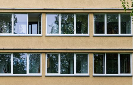 Facade of social housing in a residential area of ââthe city. Close-up.の写真素材