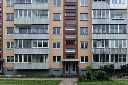 Facade of social housing in a residential area of ââthe city. Close-up.の写真素材
