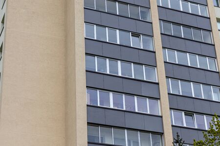 Facade of social housing in a residential area of ââthe city. Close-up.の写真素材