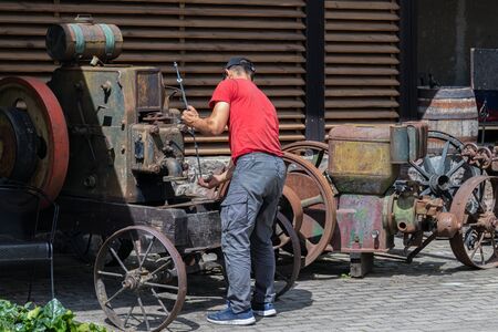 Repairs of old agricultural machinery.の写真素材