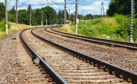 Railway electrified road leading to the city.の写真素材