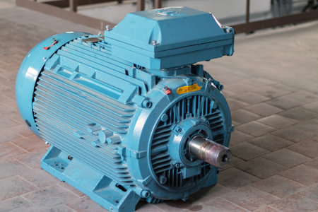 Industry. High power electric motor without belt pulley. Three-quarter view.