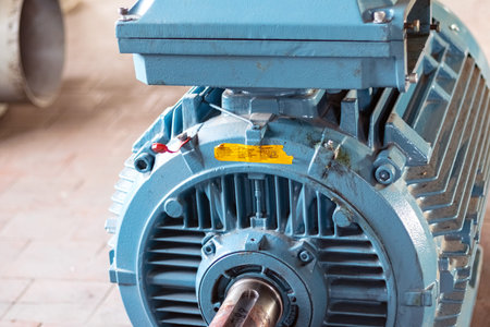 Industry. High power electric motor without belt pulley. Close-up.