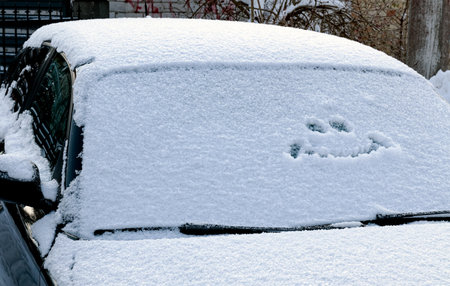 Smiley on the windshield of the car. close-up.の写真素材