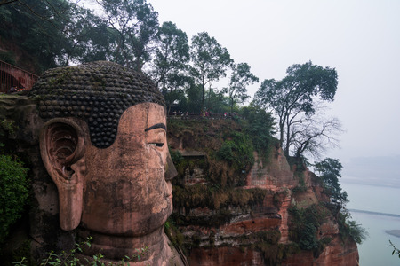 View of the Buddha statue in Leshan, China. Leshan Buddha is the world's largest statue of Buddha, whose height is 71 meters.の写真素材