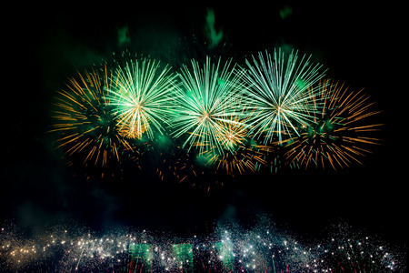 Firework  with a light show at night.の写真素材