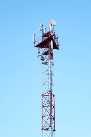 Cell tower on a background of blue sky