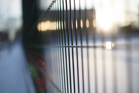 metal fence at dawnの写真素材