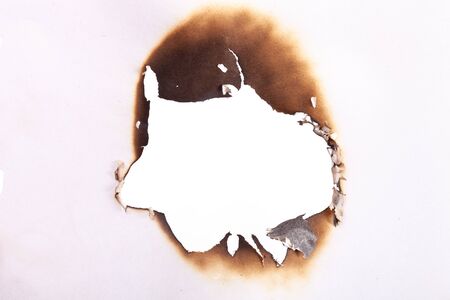 burnt paper edges isolated on white backgroundの写真素材