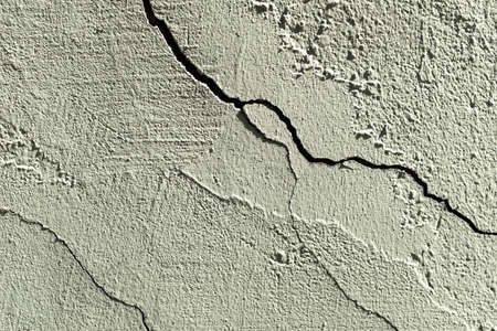stone wall with cracks and texture paint. High quality photoの写真素材