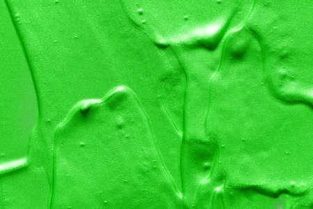 green oil paint. background for designerの写真素材