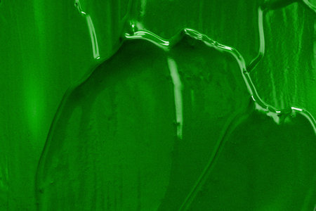 green oil paint. background for designer