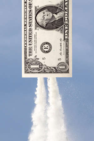 a dollar flying into the sky.の写真素材
