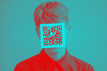man with qr code on his face